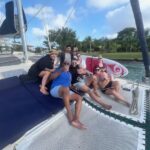 friends on catamaran tulum