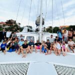 family on catamaran tulum