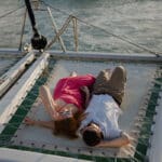 couple on catamaran