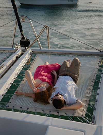 couple on catamaran