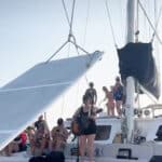 Singer on catamaran