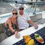 couple snacking on yacht