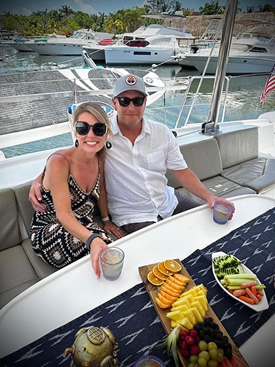 couple snacking on yacht